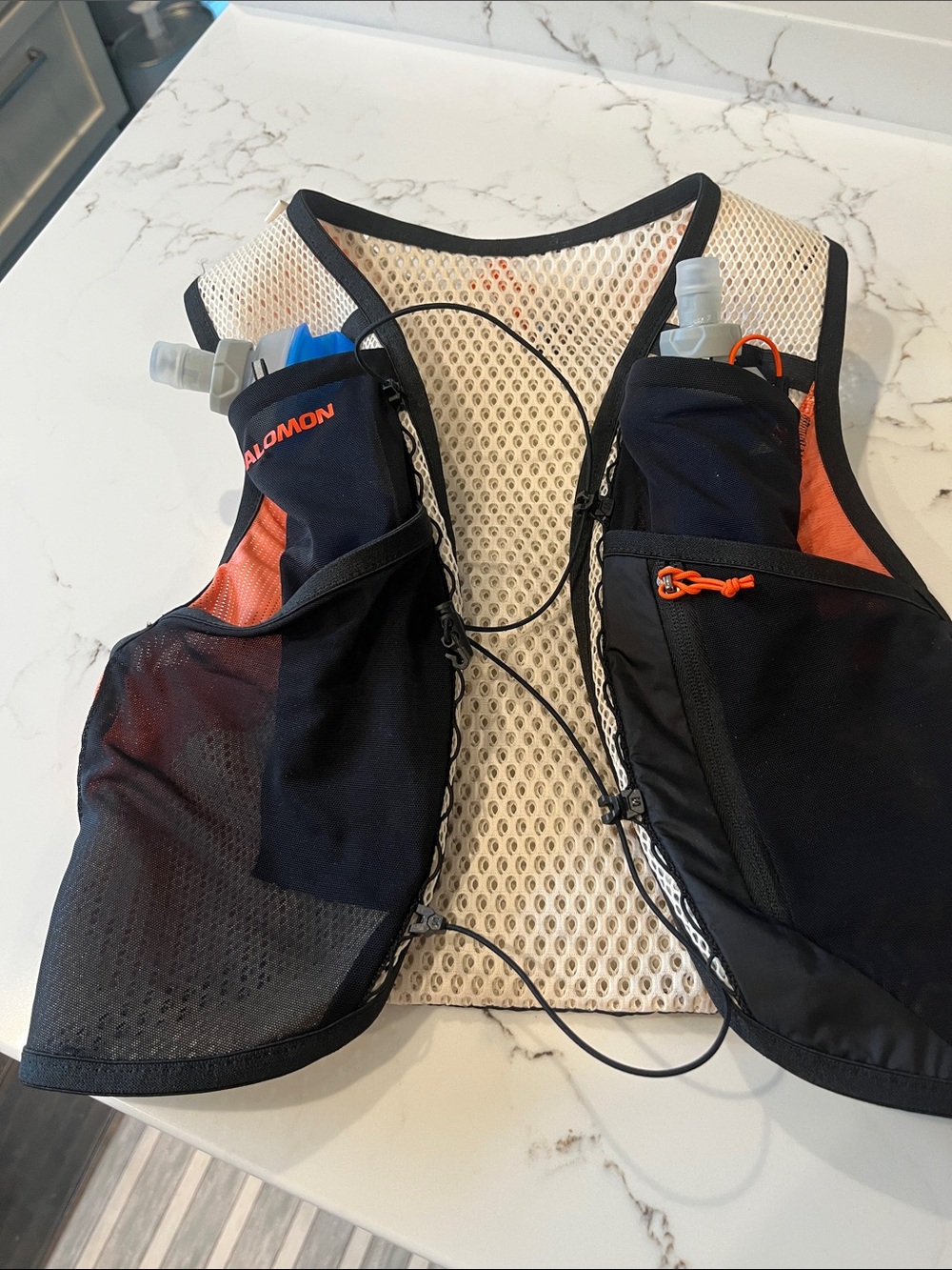 Salomon Black and Orange Hydration Vest small runners hikers